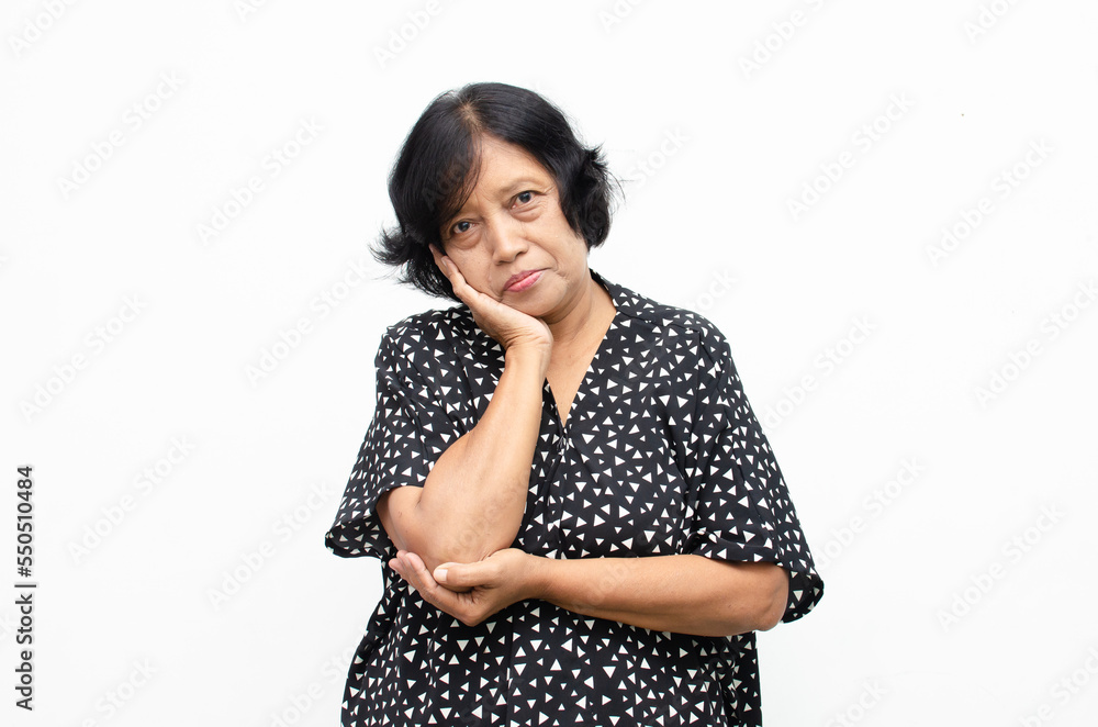 Portrait of happy ecstatic senior asian woman in overjoyed,surprised and shocked expression Portrait of happy ecstatic senior asian woman in overjoyed,surprised and shocked expression