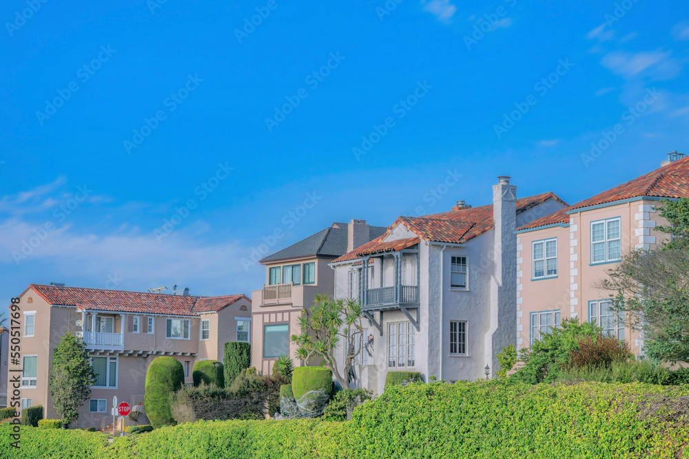 Multi-storey homes at a sunny neighborhood in San Francisco California