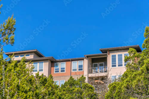 New construction of beautiful houses in Lake Austin with blue sky background