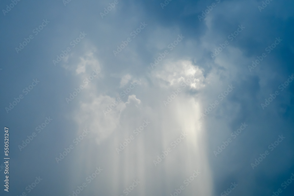 Amazing sun ray and light through the clouds against a overcast sky Amazing sun ray and light through the clouds against a overcast sky