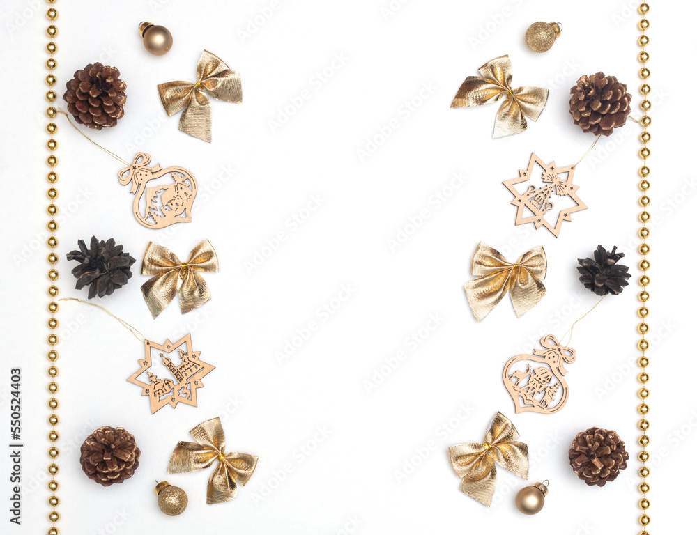 Christmas or winter white background with Christmas decorations and pine cones. Xmas greeting card mock-up. New Year holiday concept. Flat lay style with copy space