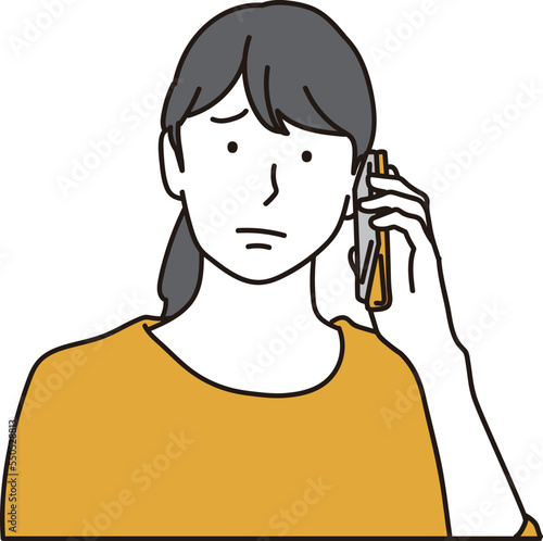 トラブルで電話をかけるアジア人女性