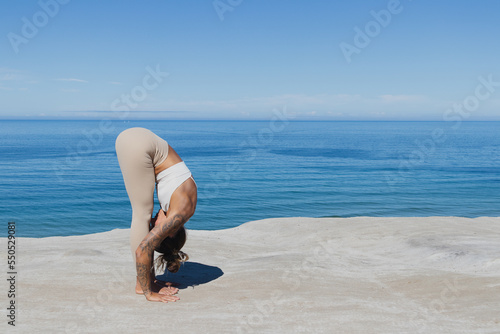 Uttanasana Pádahastásana Yoga on the beach Forward fold