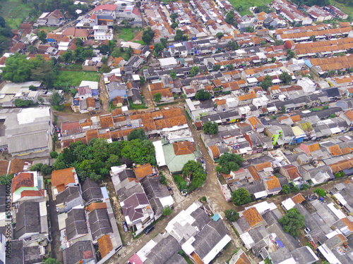 Abstract Defocused Blurred Background aerial view of neatly arranged residents' houses in the Cikancung area - Indonesia. Not Focus