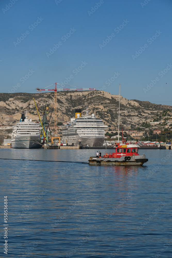 Phoenix cruiseship Artania and Costa cruise ship liner Pacifica for maintenance repair overhaul dry dock service work in port of Marseille Provence, France