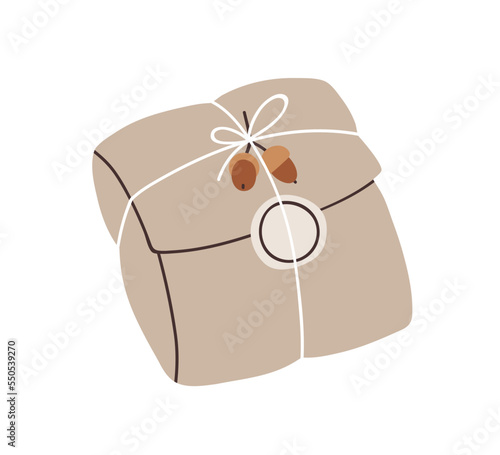 Holiday gift in rustic wrapping. Craft present, festive surprise wrapped in s...