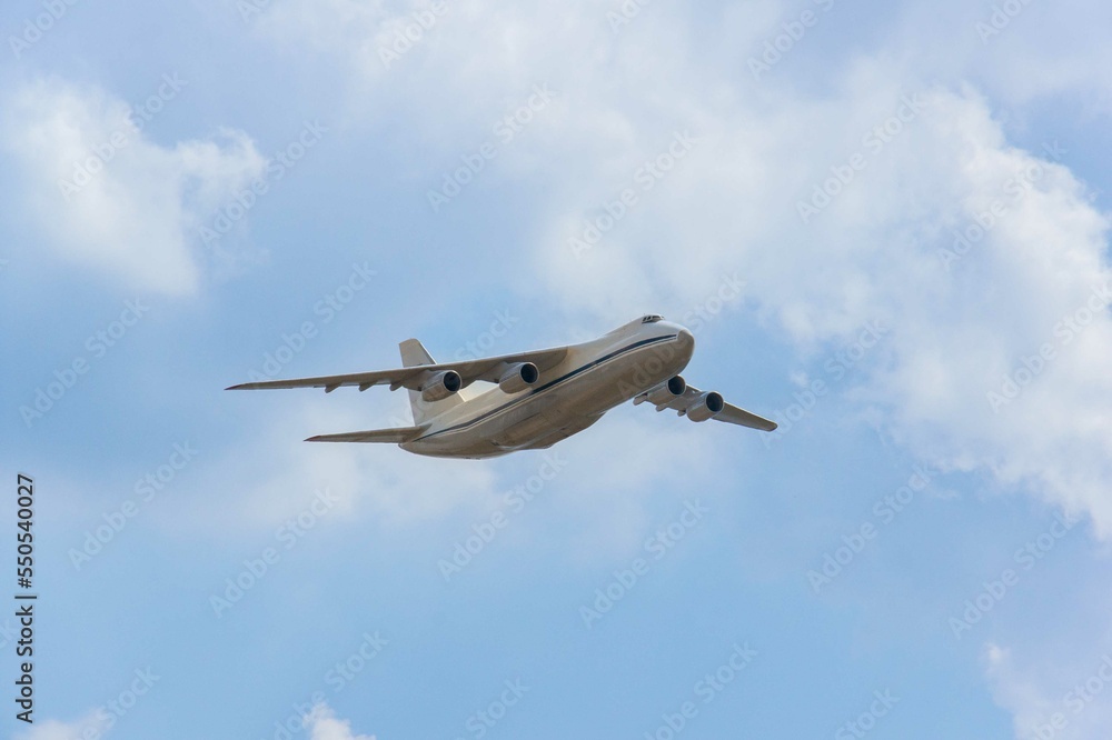 Naklejka premium Heavy long-haul transport aircraft An-124-100 Ruslan (NATO - Condor) of Volga-Dnepr Airlines performs demonstration flight. 100th anniversary of Russian Air Force.. Zhukovsky, Russia - August 12, 2012