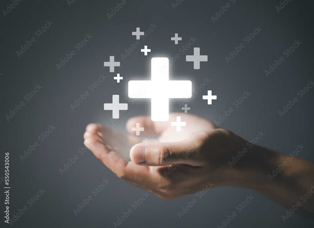 businessman hand showing a medical plus sign Concepts of family protection, health care, safe insurance
businessman hand showing a medical plus sign Concepts of family protection, health care, safe insurance