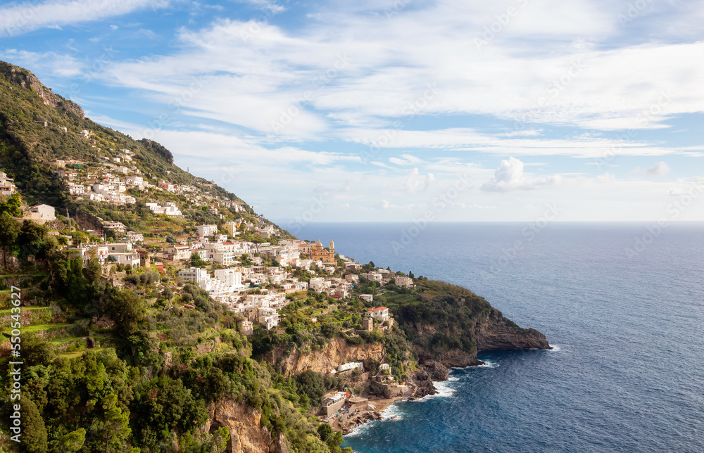 Touristic Town, Vettica Maggiore, on Rocky Cliffs and Mountain Landscape by the Tyrrhenian Sea. Amalfi Coast, Italy. Touristic Town, Vettica Maggiore, on Rocky Cliffs and Mountain Landscape by the Tyrrhenian Sea. Amalfi Coast, Italy.