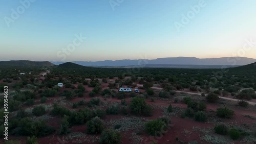 Campervans Boondocking At Sedona Semi-Desert Landscape, Arizona, United States. - Drone Shot