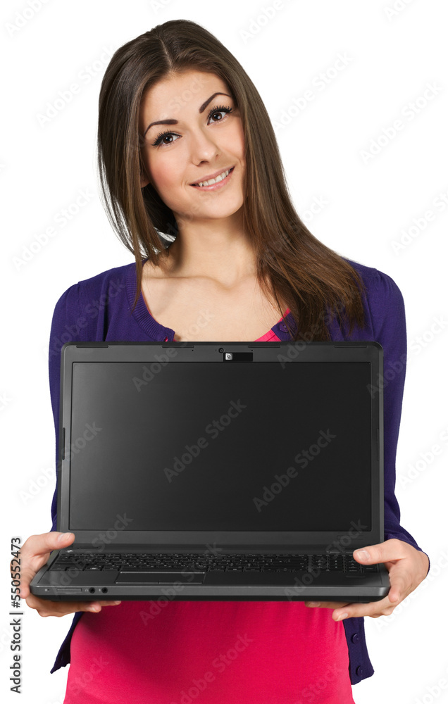 Friendly Young Woman Standing and Holding Laptop - Isolated Friendly Young Woman Standing and Holding Laptop - Isolated
