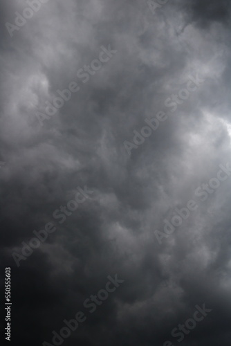 Dark ominous grey storm clouds. Dramatic sky in nature