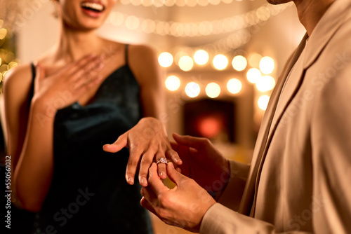 Fotografie Close Up Of Loving Couple Celebrating Engagement At Party Together