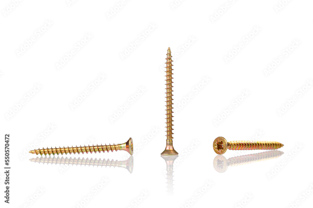 macro screw of golden color on a white background macro screw of golden color on a white background