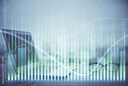 Forex Chart hologram on table with computer background. Multi exposure. Concept of financial markets.