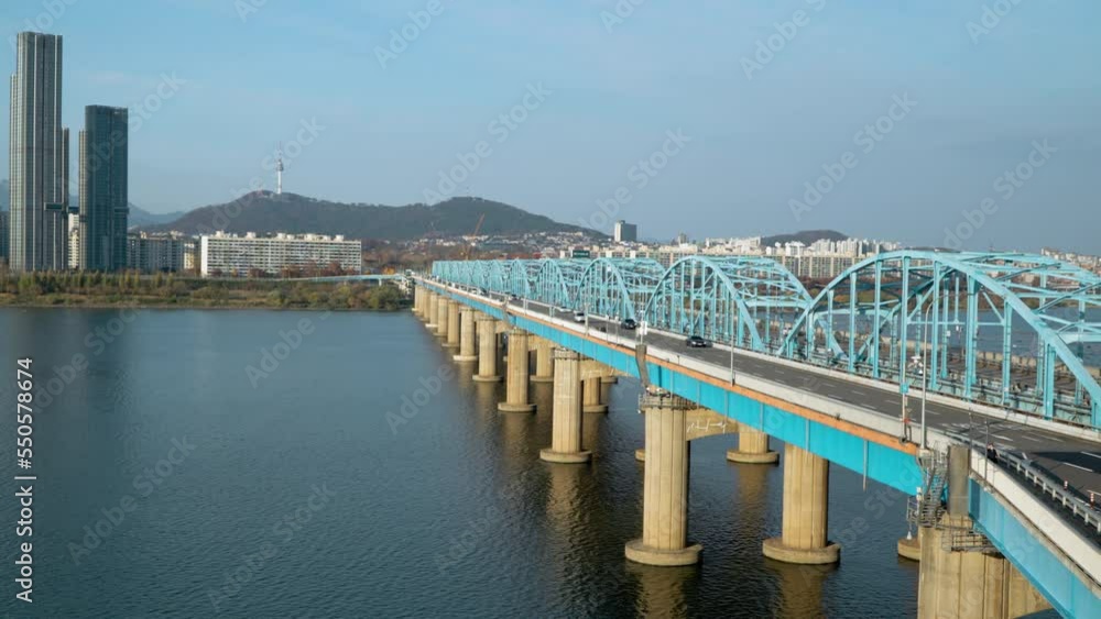 Vehicles Driving Through Dongjak Bridge Across The Han River In Seoul, South Korea. - wide static Vehicles Driving Through Dongjak Bridge Across The Han River In Seoul, South Korea. - wide static
