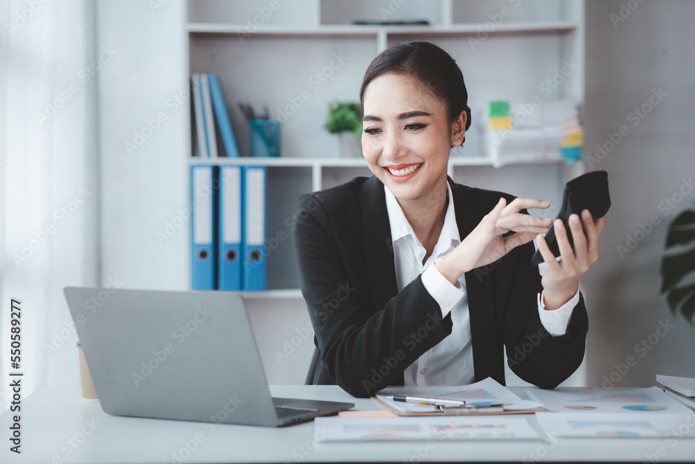 Beautiful Asian woman is a businesswoman who leads a new generation of startups, a woman who runs and manages a business plan to build confidence and stability in business, woman-led business concept. Beautiful Asian woman is a businesswoman who leads a new generation of startups, a woman who runs and manages a business plan to build confidence and stability in business, woman-led business concept.