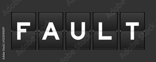 Black color analog flip board with word fault on gray background