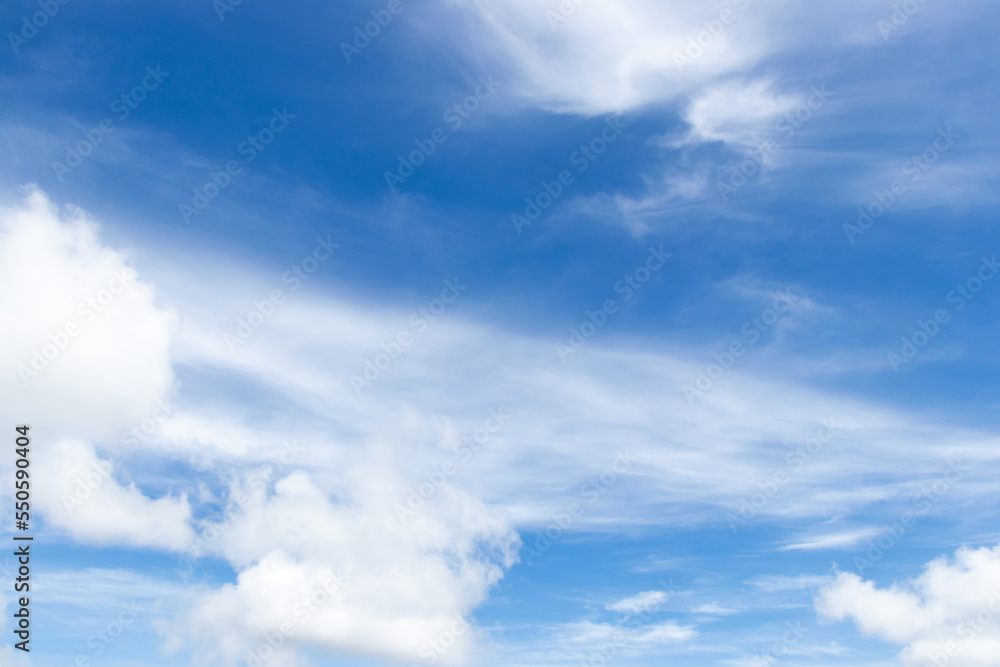 Fototapeta premium Blue color sky with white fluffy cloud background
