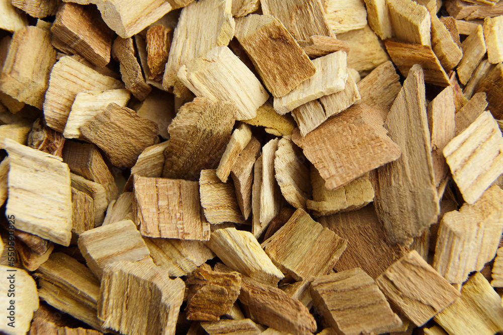 Wood chips for smocking texture background. Natural wood smoking chunks, top view Wood chips for smocking texture background. Natural wood smoking chunks, top view
