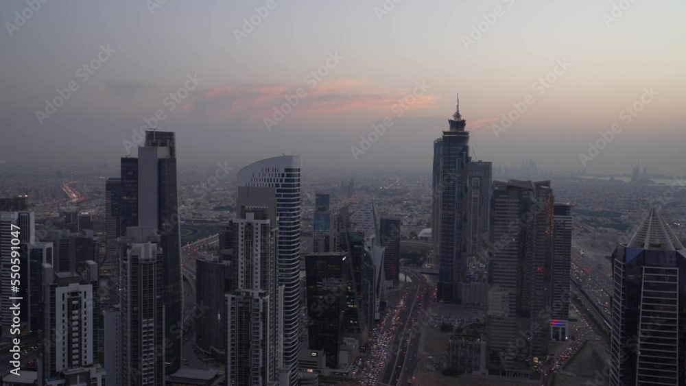 Sunset Skyscrapers and towers in the atmosphere of the city of Dubai Sunset Skyscrapers and towers in the atmosphere of the city of Dubai