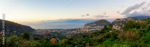 View of Touristic Town, Sorrento, Italy. Coast of Tyrrhenian Sea. Cloudy Sky Sunset. Panorama