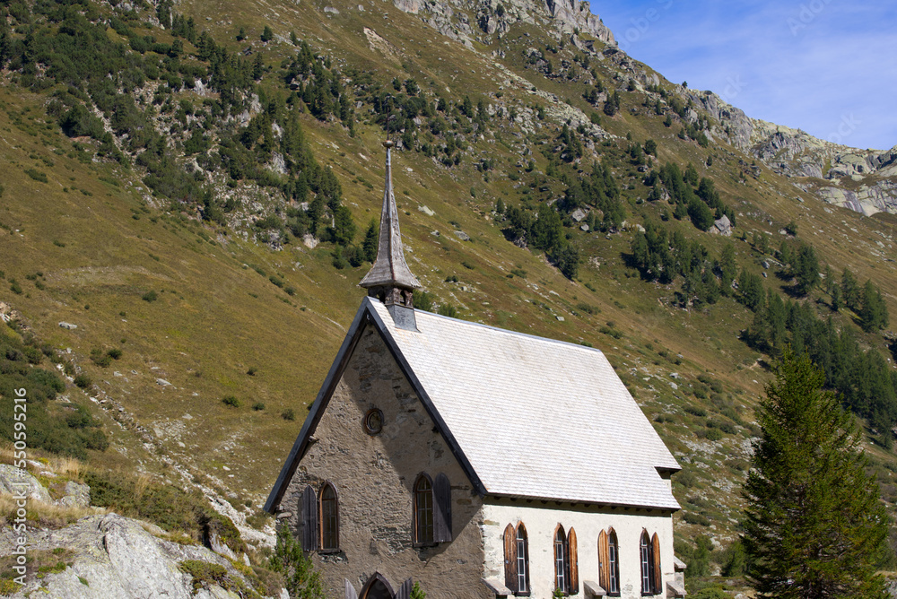 Anglican church at mountain village Gletsch, Canton Valais, on a sunny late summer day. Photo taken September 12th, 2022, Gletsch, Switzerland.