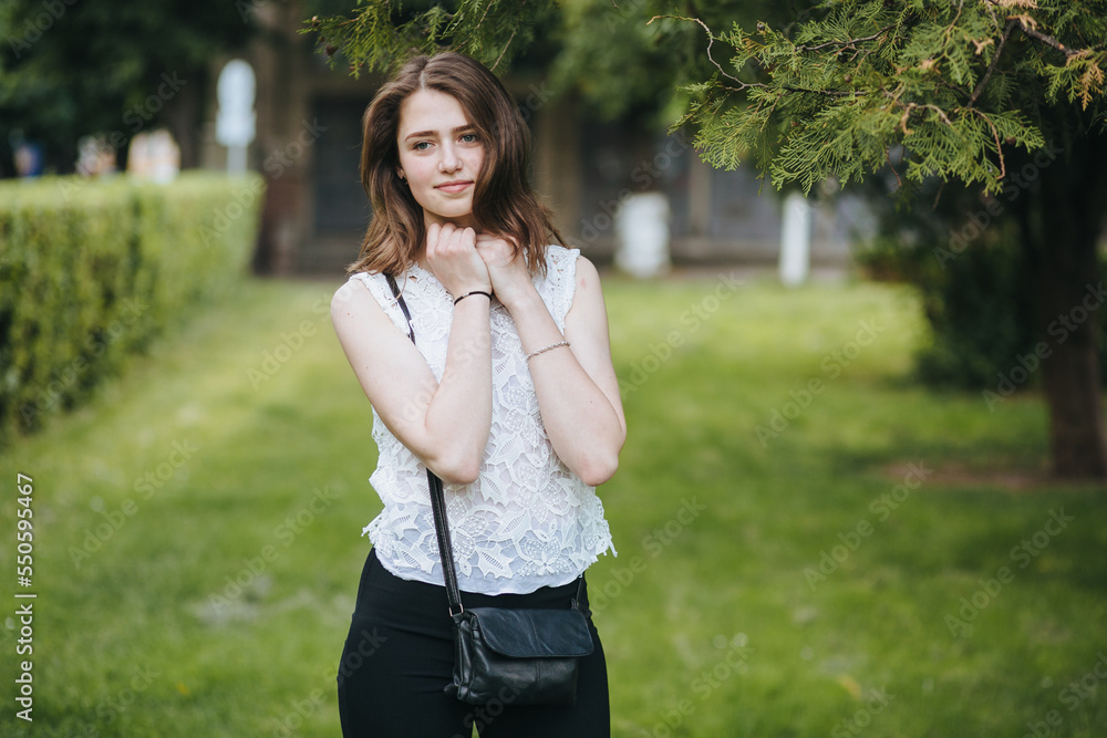 Beautiful young girl smiling in the park. healthy new life image Beautiful young girl smiling in the park. healthy new life image