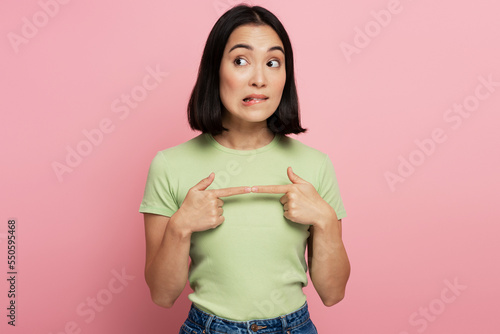 Photos Thoughtful girl pondering serious issues, looking with uncertain hesitant expres
