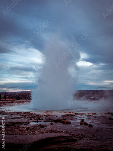 Geyser eruption closeup. The Great Geysir hot spring in Iceland. 