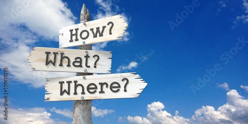 Fotografi How, what, where - wooden signpost with three arrows