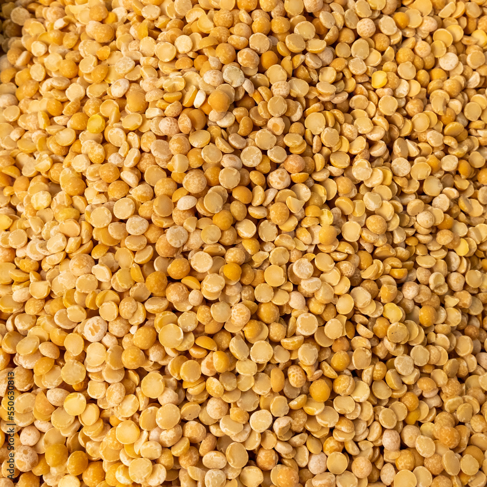 Yellow dry peas texture background. Natural healthy vegan food, diet concept