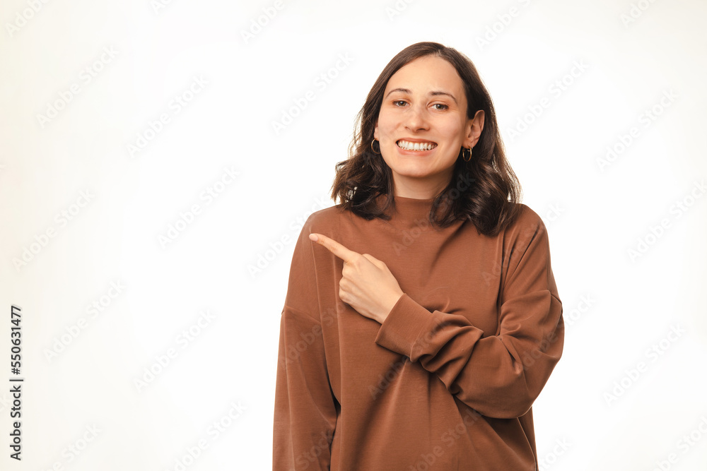 Look at the message I have got for you says a woman pointing at copy space. Look at the message I have got for you says a woman pointing at copy space.