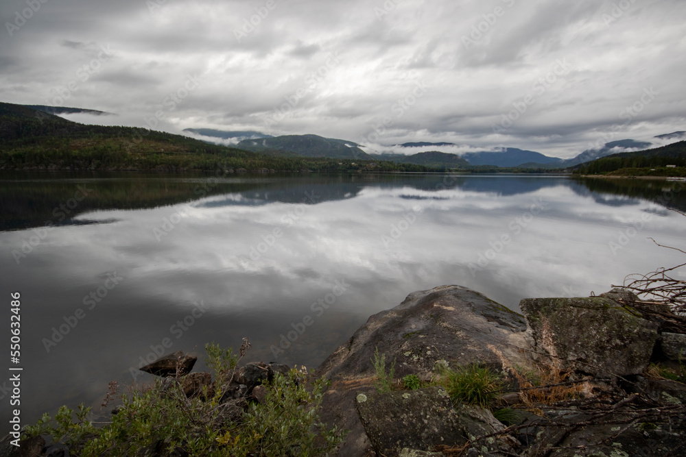 Norway. Lake and cloudy sky on a summer day