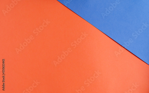 Background of blue and red paper in bright colors  geometric pattern.