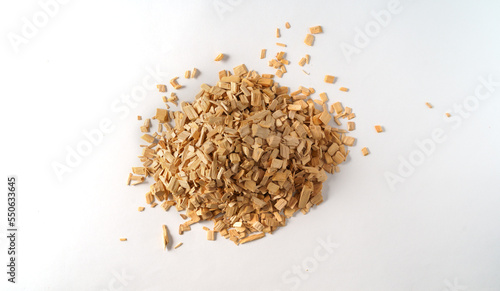 Top view a pile of wood wood texture chips isolated on white background.