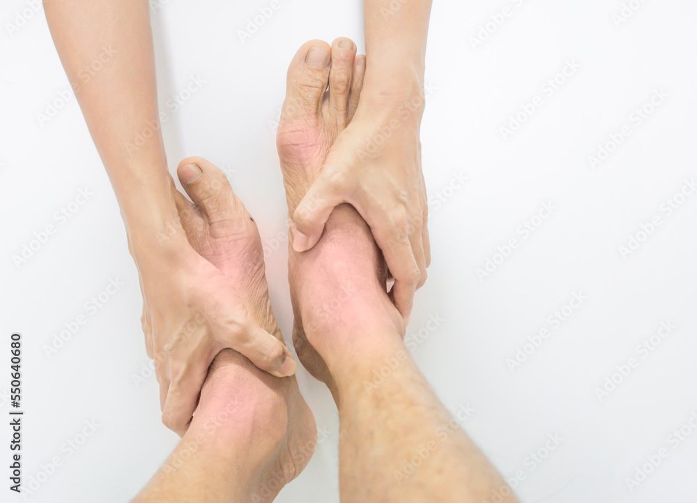 Fototapeta premium Bare feet, elderly person and massage, health and medical concept.
