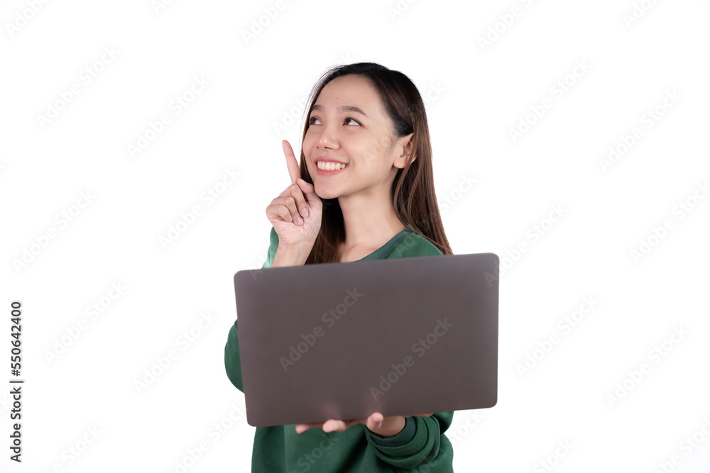 Portrait of an excited young asian girl holding laptop computer and celebrating success isolated over white background. Portrait of an excited young asian girl holding laptop computer and celebrating success isolated over white background.