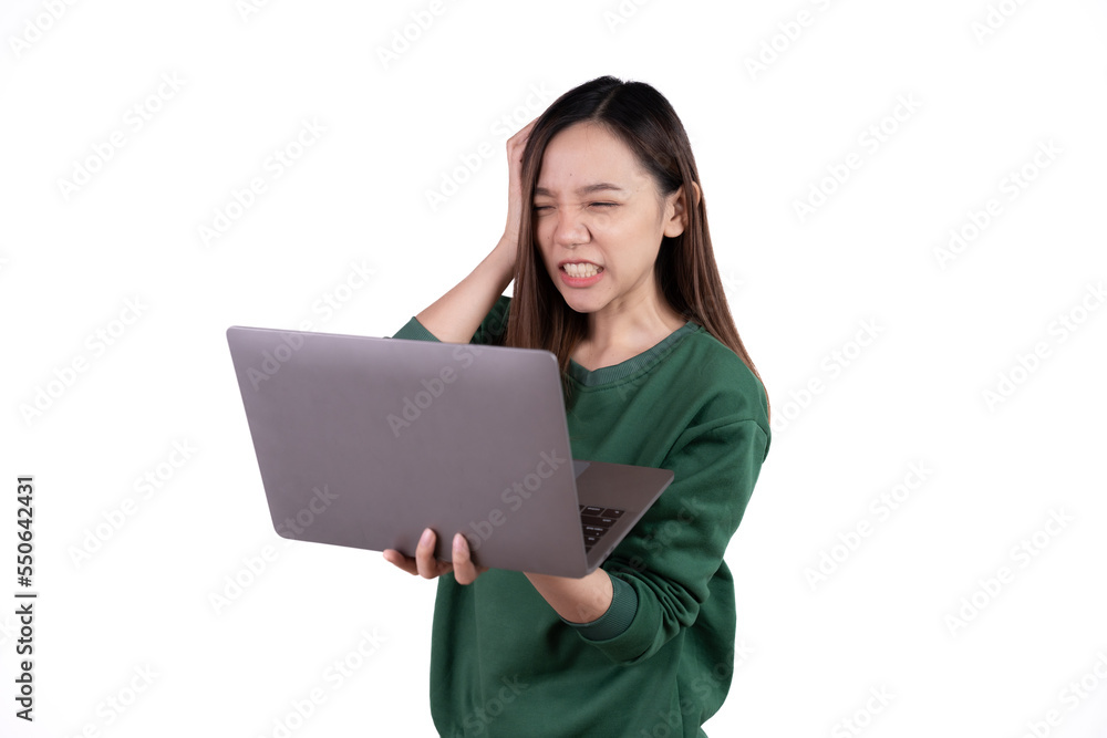 Shocked young adult asian woman working on laptop compute isolated white background. Shocked young adult asian woman working on laptop compute isolated white background.