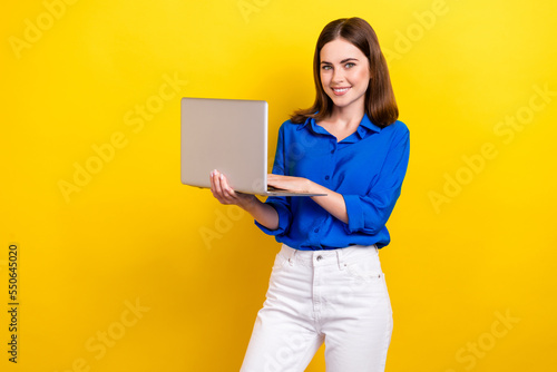 Photo of adorable positive pretty lady arm pointing herself impressed surprise gift isolated on yellow color background