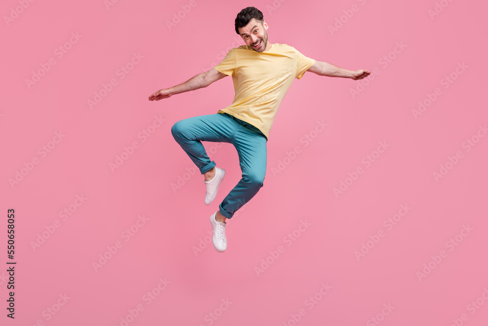 Full length photo of carefree careless boy celebrating birthday rejoice cool gifts presents isolated on pink color background
