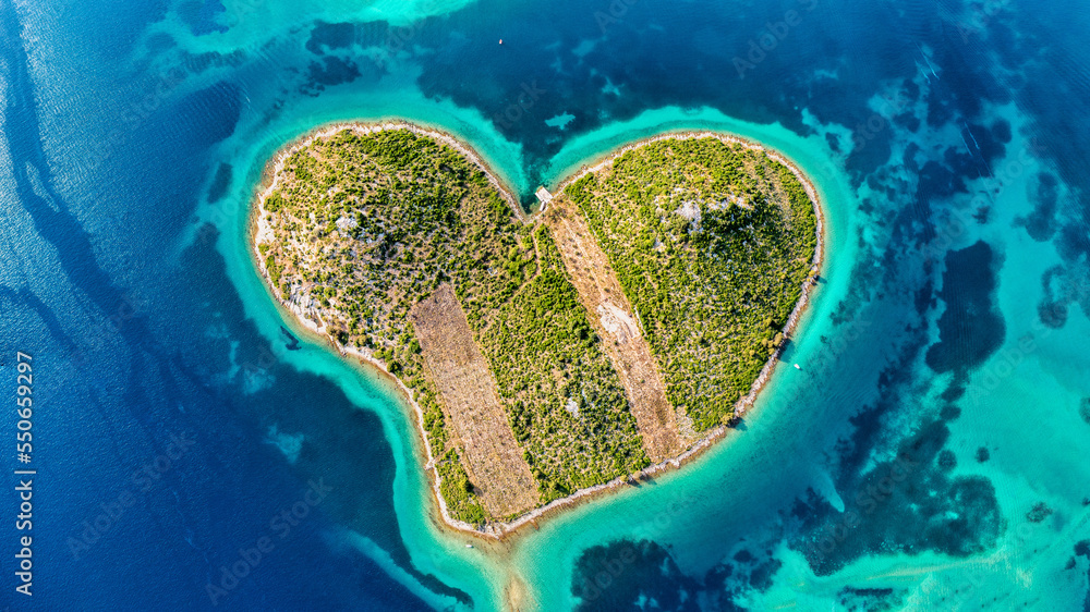 Aerial view of the heart shaped Galesnjak island on the adriatic coast, Zadar, Croatia. Heart shaped island of Galesnjak in Zadar archipelago aerial view, Dalmatia region of Croatia. - obrazy, fototapety, plakaty 
