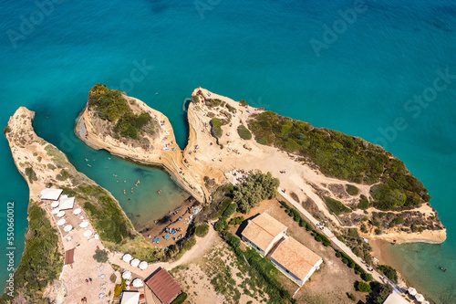 Famous Canal D'amour in Sidari, Corfu island, Greece. Famous Canal d'Amour beach with beautiful rocky coastline in amazing blue Ionian Sea in Sidari holiday village on Corfu island in Greece. photo