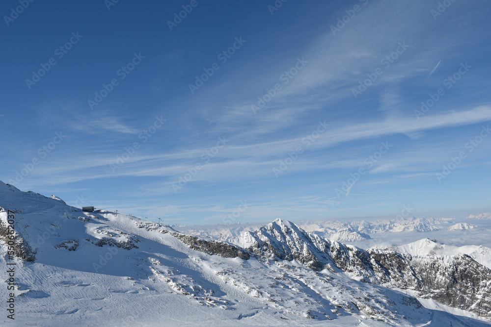 Sunny day on a Hintertux glacier with view of Tirol Alps Sunny day on a Hintertux glacier with view of Tirol Alps