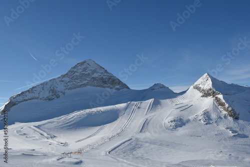 Sunny day on a Hintertux glacier with view of Tirol Alps