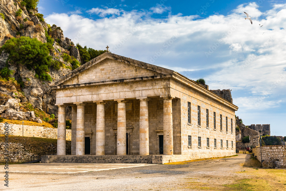 Fototapeta premium The old Venetian fortress of Corfu town and Holy Church of Saint George, Corfu, Greece. The Old Fortress of Corfu is a Venetian fortress in the city of Corfu. Venetian Old Fortress (Palaio Frourio)