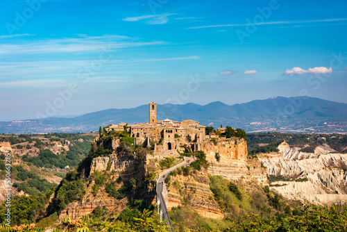 The famous Civita di Bagnoregio on a sunny day. Province of Viterbo  Lazio  Italy. Medieval town on the mountain  Civita di Bagnoregio  popular touristic stop at Tuscany  Italy.