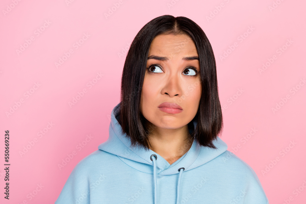 Photo of unhappy lady look empty blank space ad upset high price clothes discount sale limited time only isolated on pink color background Photo of unhappy lady look empty blank space ad upset high price clothes discount sale limited time only isolated on pink color background