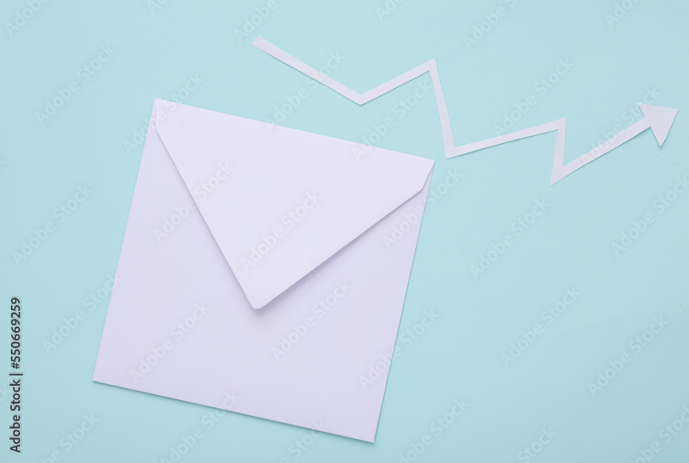 White envelope with a curved growth arrow on a blue background. Business concept