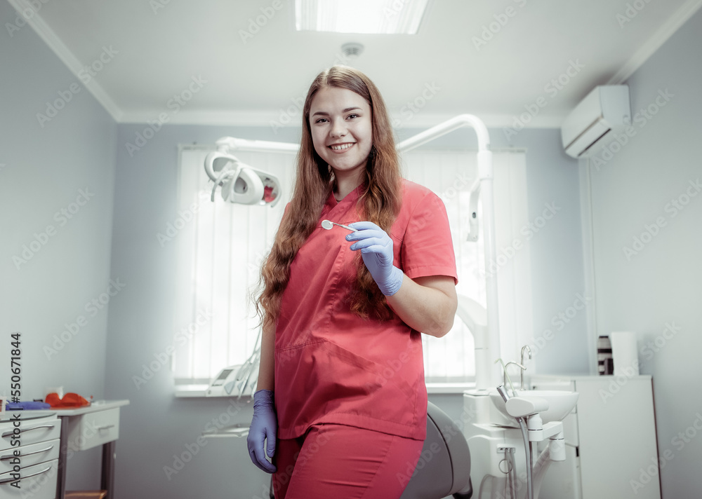 Woman doctor dentist waiting for patient in dental clinic Woman doctor dentist waiting for patient in dental clinic